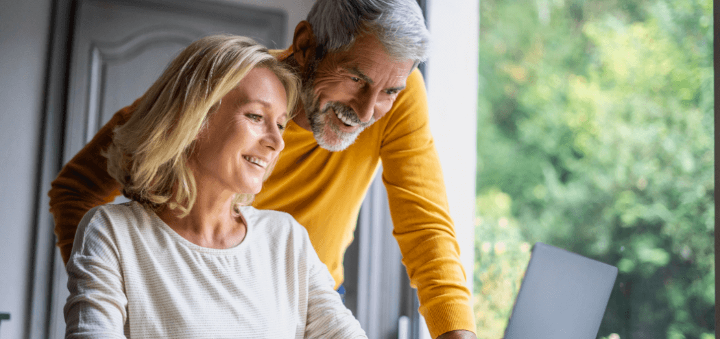 Couple looking at laptop